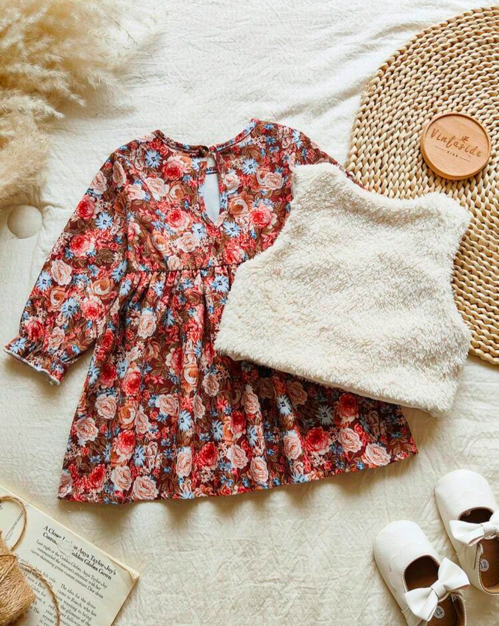 Girls' brown floral long sleeve frock styled with a cream textured layer and white bow shoes
