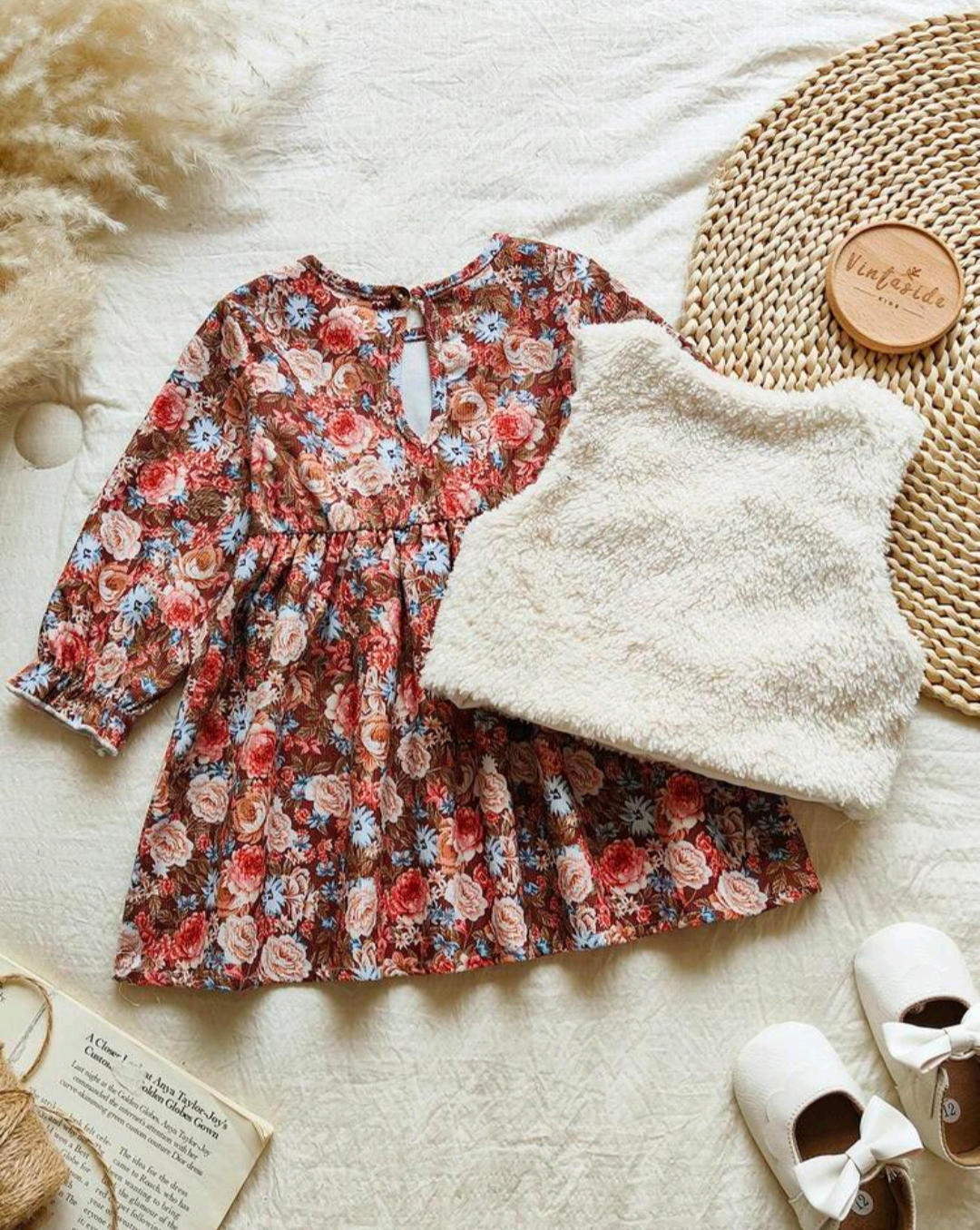 Girls' brown floral long sleeve frock styled with a cream textured layer and white bow shoes