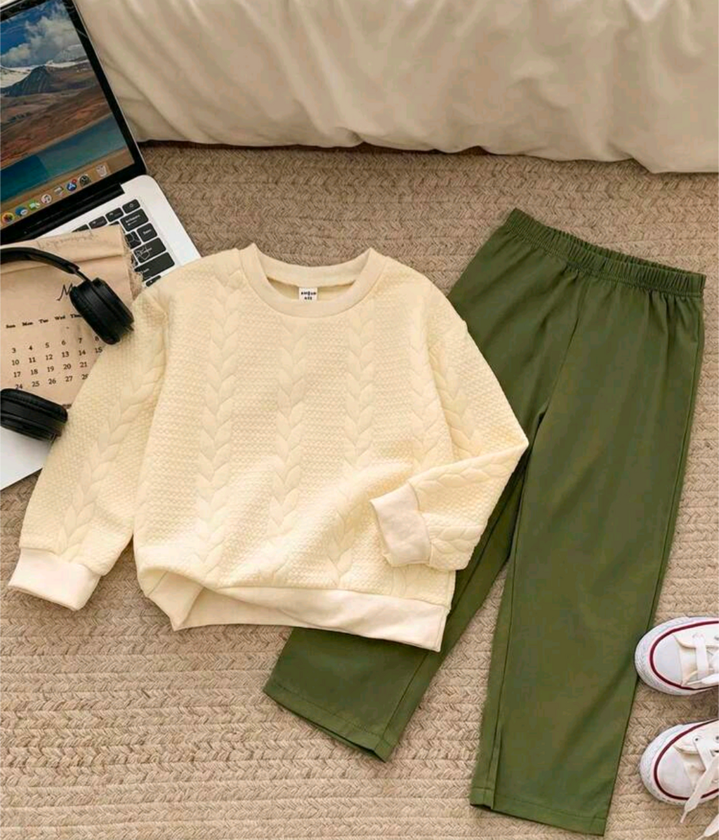 Kids cream cable knit sweatshirt and olive green trouser co-ord set laid flat